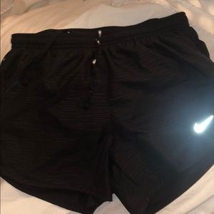 Nike tempo running shorts with zipper